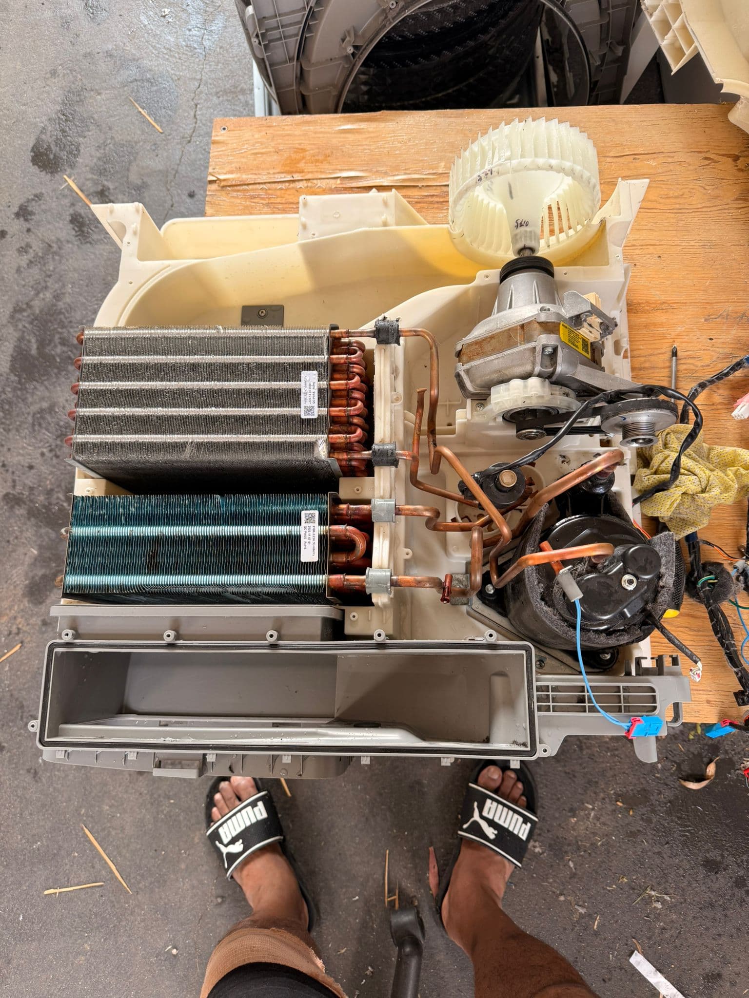Split system air conditioner disassembled for repair