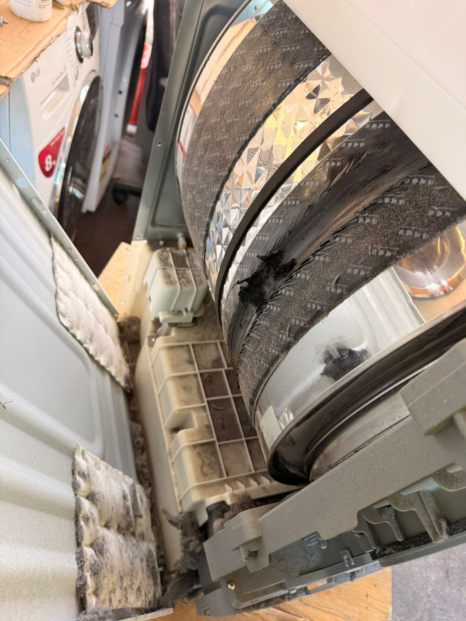 Dryer lint buildup cleaning and maintenance